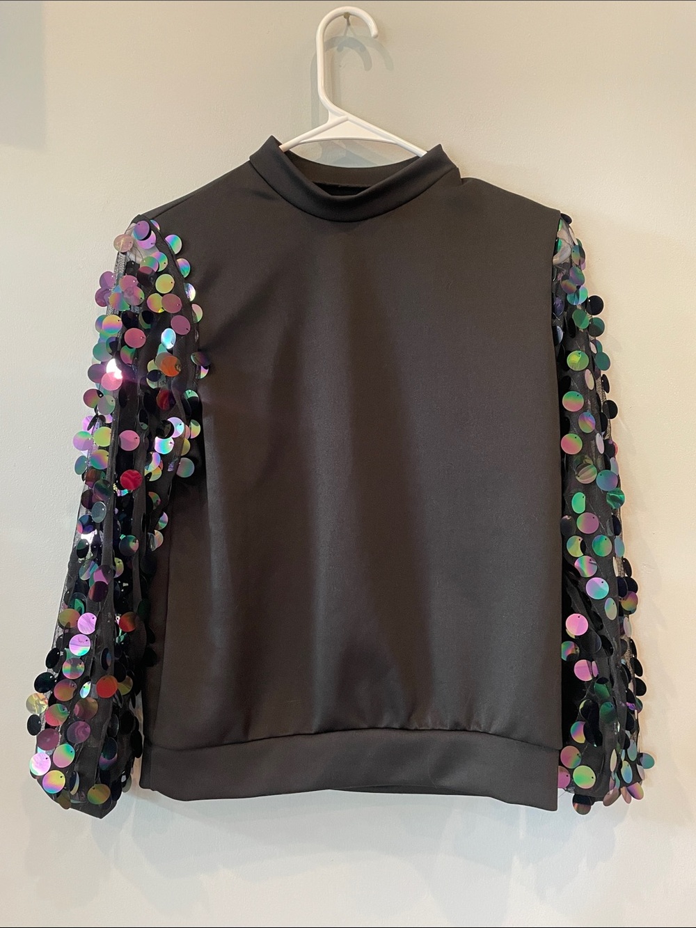 Black long sleeve with sequined sleeves